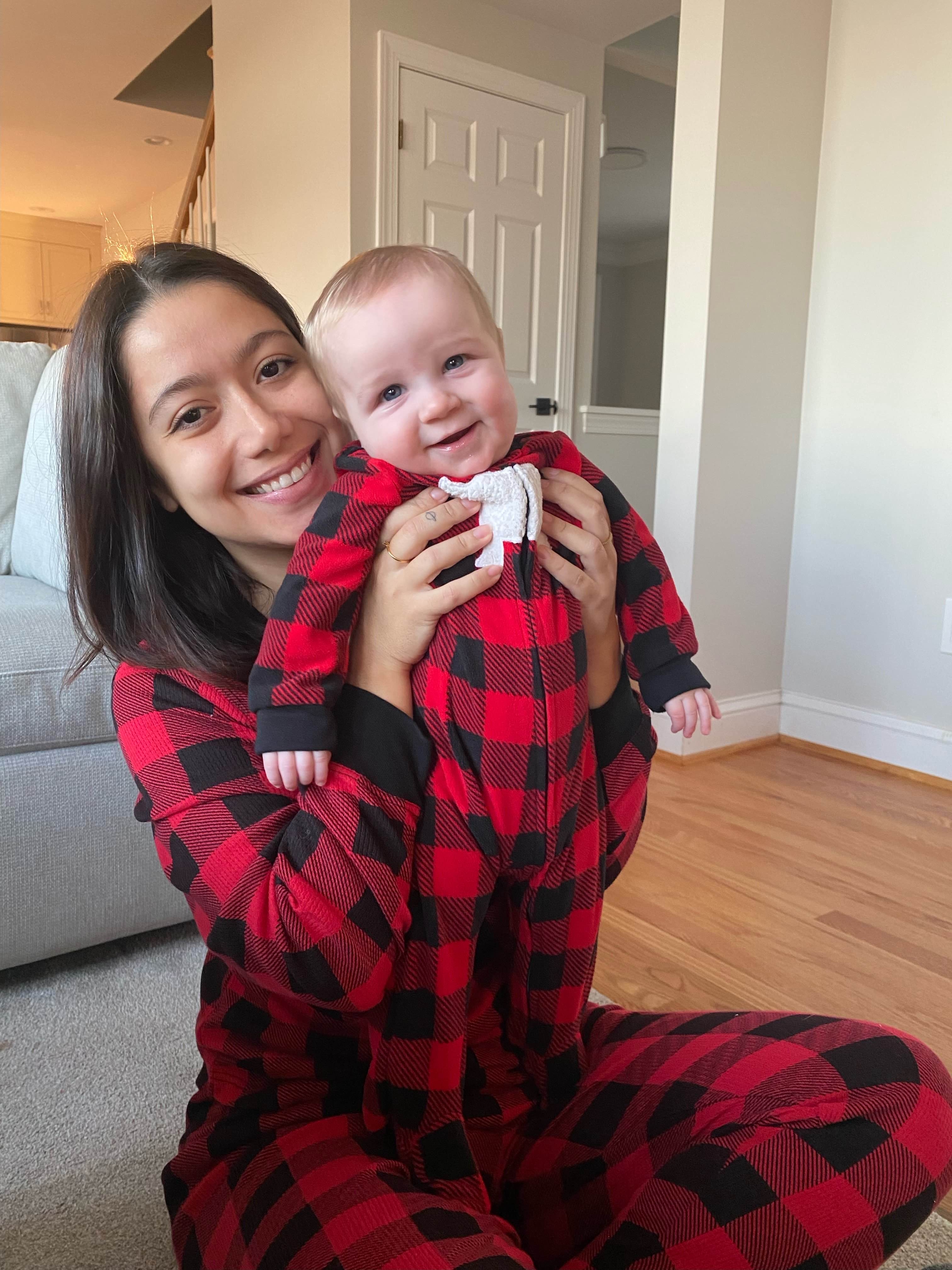 Gabriella with baby in matching plaid